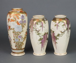A pair of early 20th Century hexagonal Satsuma vases decorated with exotic birds and trailing wisteria 7", a larger ditto decorated with peony 9" 