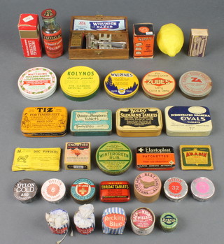 A circular tin of Zubes, an Ovet Dog Powders sachet, a Boldo Slimming Tablets tin, an Eucryl tooth powder tin and various other tins 
