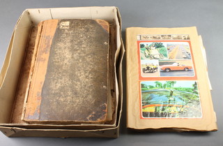A 19th Century leather bound scrapbook containing various monochrome and coloured prints and 1 other of motor cars 