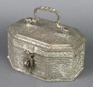 A Persian embossed metal spice box with hinged lid, the interior fitted a tray 3" x 8" x 6" 