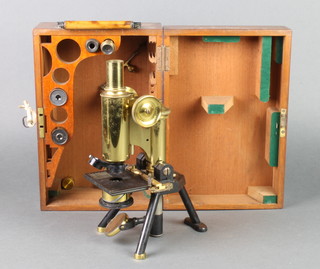 J Swift & Son, a brass single pillar microscope contained in a mahogany case 
