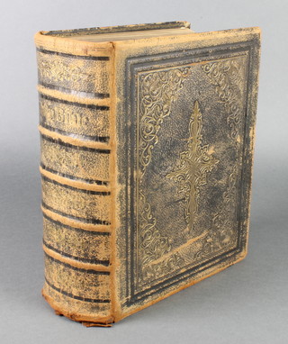 An Illustrated Family Bible with 1200 wood engravings, leather bound 
