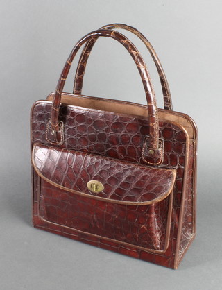 A lady's crocodile handbag 