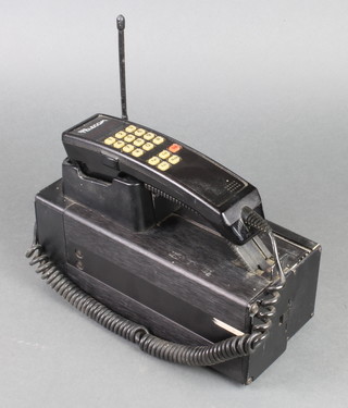 From the first generation of mobile phones, a late 1980's Motorola 4500X mobile phone, branded British Telecom 
