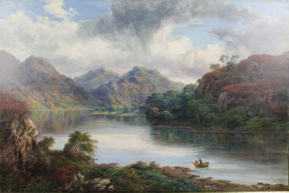 A 19th Century oil on canvas, unsigned, an extensive Scottish lake scene with figures in a boat and distant mountains 19 1/2" x 29 1/2"