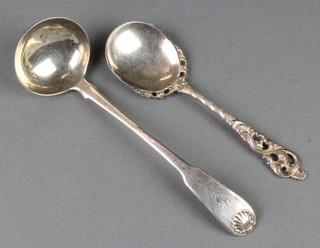 A Georgian silver ladle Edinburgh, a Continental pierced spoon, 46 grams