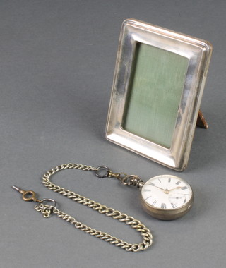 A rectangular silver photograph frame  4 1/2" x 3 1/2" together with a plated Albert and the interior of a pair cased pocket watch 