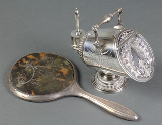 An Edwardian silver plated sugar scuttle with chased decoration and a silver and mother of pearl piquet hand mirror