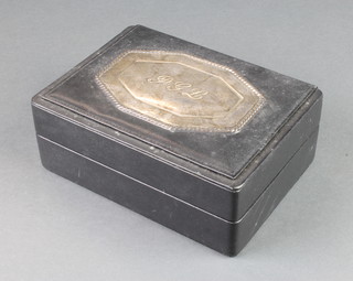 A silver mounted leather jewellery box with repousse panel 