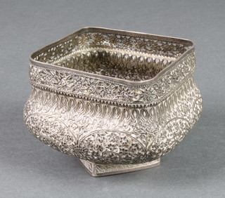 A Persian silver rounded square bowl with floral decoration 3 1/2", 192 grams