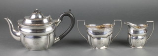 A Victorian gentleman's silver 3 piece breakfast tea set with ebony mounts Chester 1897, gross 582 grams