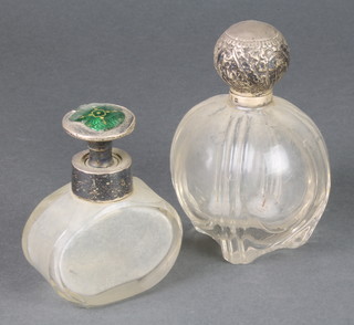 A glass scent bottle with silver mounted cover 5", a ditto with guilloche enamelled top 