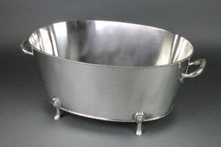 A plated oval 2 handled champagne cooler on lion head and claw feet 22" 
