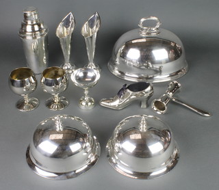 A silver plated pin cushion in the form of a shoe, 3 silver plated meat covers and minor plated items