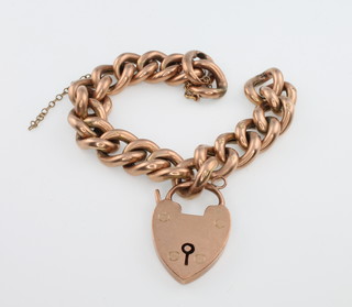 A 9ct yellow gold hollow link bracelet with padlock 12 grams 
