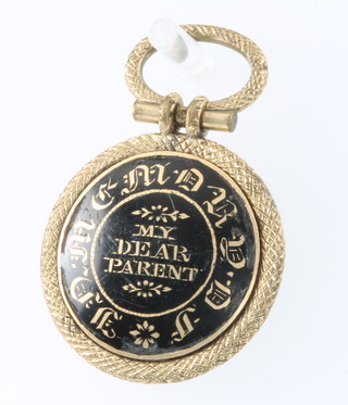 A 19th Century in memorium gilt and enamelled hair backed pendant 