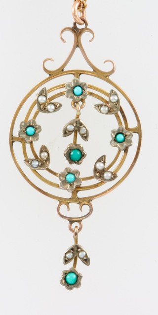 An Edwardian 9ct gold necklace supporting a turquoise and seed pearl pendant