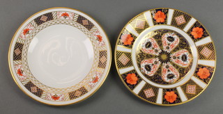 A Royal Crown Derby Japan pattern plate 1128 6 1/2", a ditto Derby border plate A1253 6 1/2" 