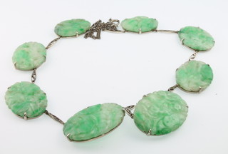 A white gold? 8 plaque carved jade necklace