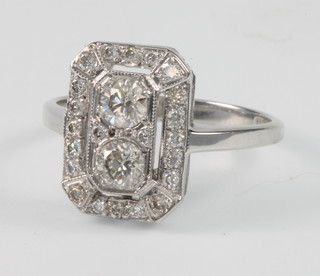 An 18ct white gold Art Deco style up ringer ring 0.80ct, size N 1/2
