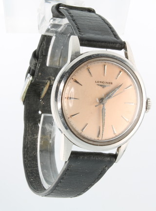 A 1950's gentleman's Longines steel cased wristwatch on a leather strap 