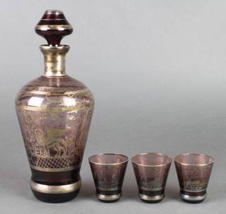 An Art Deco silvered liqueur set decorated with Venetian scenes comprising a decanter and 3 tots 