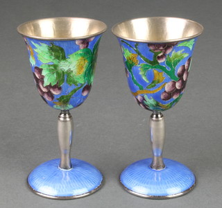 A pair of 20th Century Korean silver and enamelled goblets decorated with grapes and vines 4 1/2", boxed 