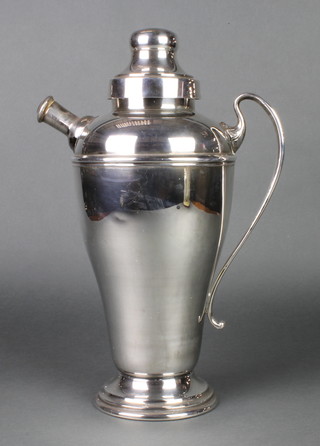 An American silver plated bulbous cocktail pitcher with scroll handle 15" 