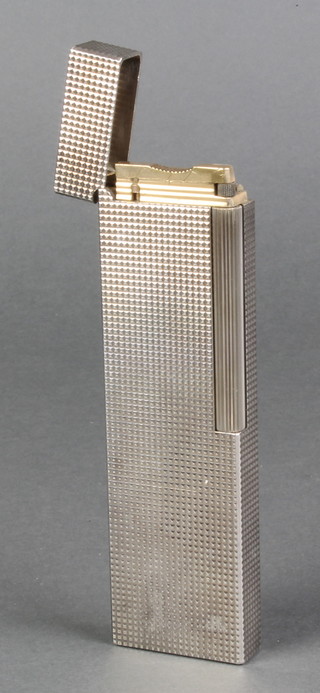 An S T Dupont silver plated diamond head table top lighter, stamped B4107 5 1/2" x 1 3/4" x 1/2" 