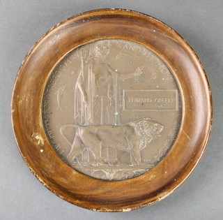 A World War I death plaque to Edward Green, framed 