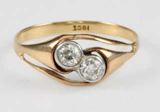 An 18ct yellow gold 2 stone brilliant cut diamond ring, each approx. 0.20ct, size O