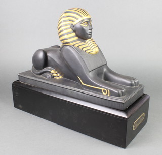 A Franklin Mint black porcelain figure of a sphinx - The Sovereign of the Nile 16" 