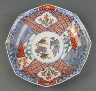 An early 20th Century Imari octagonal dish decorated with panels of flowers with 4 character mark to base 9 1/2" 