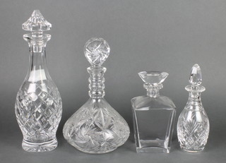 An wedge shaped clear glass decanter and stopper, base marked Orrefor AA2493 8", a Royal Doulton cut glass club shaped decanter and stopper 8", a ships decanter 10" and 1 other club shaped decanter 14"  
