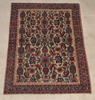 A Persian white and blue floral patterned Asfahar rug 80" x 61" 