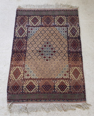 A Bokhara carpet with central medallion having panels to the sides 75" x 46" 