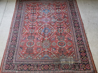 A large Antique Ziegler Mahal floral patterned carpet 162" x 123", in wear 