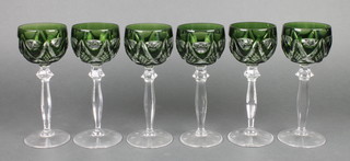 A set of 6 long stemmed hock glasses with green and overlay glass bowls 