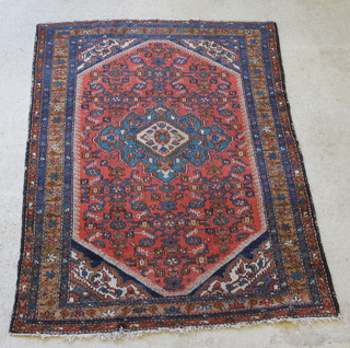 A Persian Malayer blue and red ground rug with central medallion 80" x 59" 
