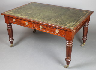 A Victorian rectangular mahogany library table with green inset writing surface, fitted 2 frieze drawers with brass ring drop handles, raised on turned supports 29"h x 54 1/2"w x 36"d 