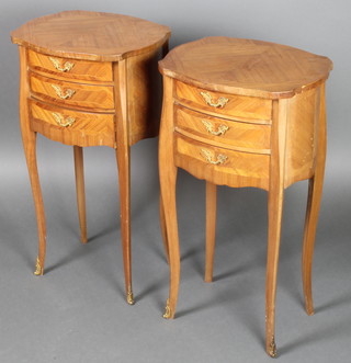 A pair of French oval shaped Kingwood bedside chests of 3 long drawers with crossbanded tops, raised on cabriole supports 28"h x 15 1/2"w x 13"d 