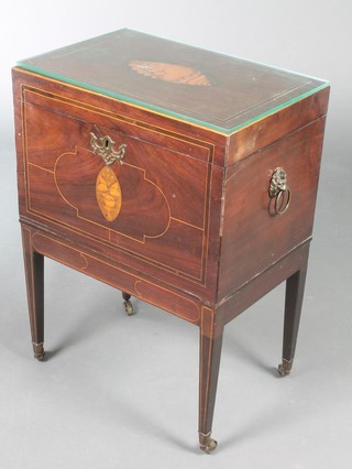 A rectangular inlaid Georgian mahogany cellarette/work box with hinged lid, the top inlaid a conch shell and with satinwood stringing having brass lion mask handles to the side, raised on square tapering supports, brass caps and castors 25"h x 18"w x 12"d 