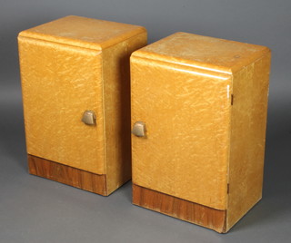 A pair of Birds Eye Maple bedside cabinets enclosed by panelled doors 24"h x 16"w x 12"d 