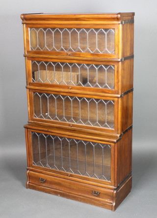 A mahogany 4 tier Globe Wernicke bookcase enclosed by lead glazed panelled doors, the base fitted a drawer 60"h x 34"w x 14 1/2"d 
