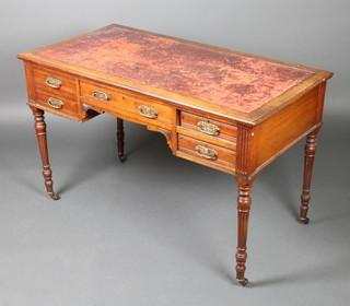 A Victorian mahogany writing table with red inset writing surface above 1 long and 4 short drawers, raised on turned fluted supports 28"h x 45"w x 24"d
