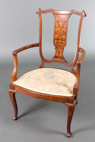 An Edwardian inlaid mahogany slat back open arm chair, raised on cabriole supports 