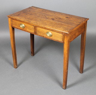 An 18th Century light oak side table fitted 2 drawers, raised on square tapering supports 27"h x 30"w x 17 1/2"d 