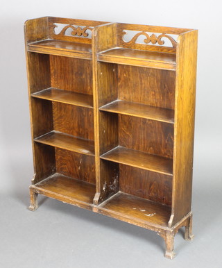 A 1930's Art Deco oak open range of 3 shelves with pierced three-quarter gallery, raised on out swept supports 39 1/2"h x 33"w x 8"d 