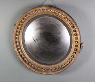 A Regency circular convex plate wall mirror contained in a gilt ball studded frame 23" 