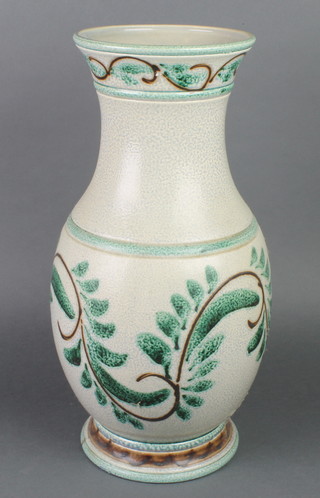 A German green and blue salt glazed vase of club form 19 1/2"  